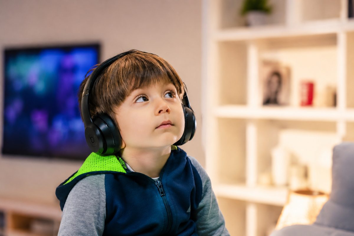 Child with sensory headphones